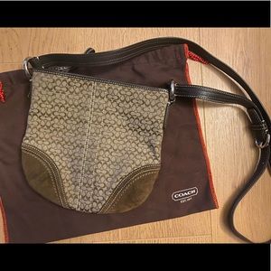 Brown, leather Coach crossbody bag.